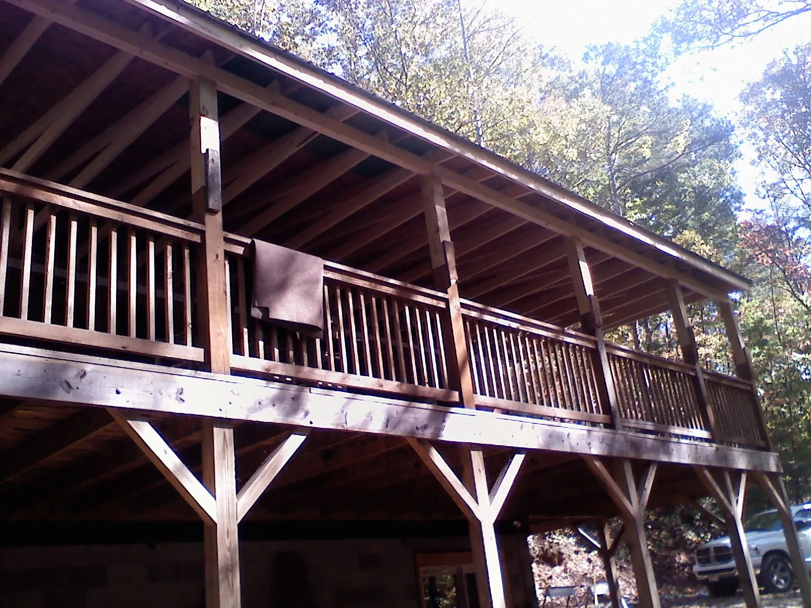 Timber framing under a new elevated porch and deck — Roof Leak Repair in Hampton Bays by Roofing Brothers